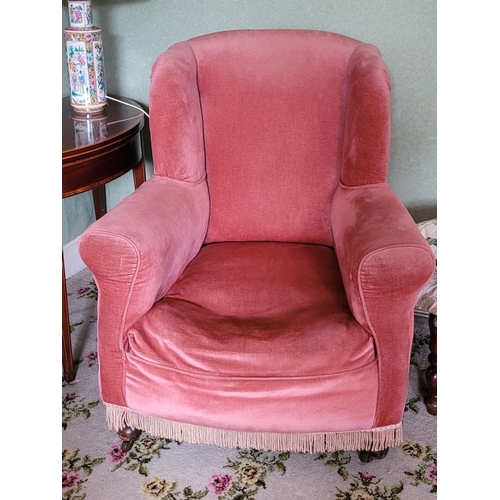 264 - TWO ANTIQUE ARMCHAIRS: (i) A WING BACKED ARMCHAIR, raised on turned leg with frill detail to the uph... 