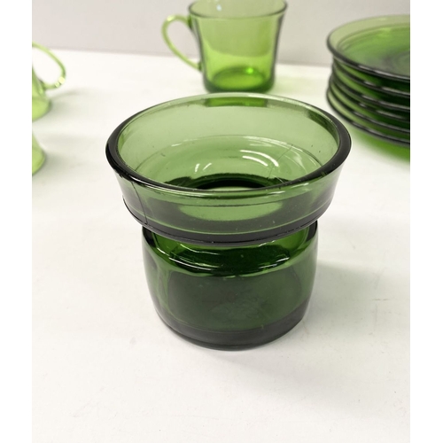 273 - A COLLECTION OF SIX FRENCH GREEN GLASS CUPS & SAUCERS, along with Dansk Designs Denmark vase. The cu... 