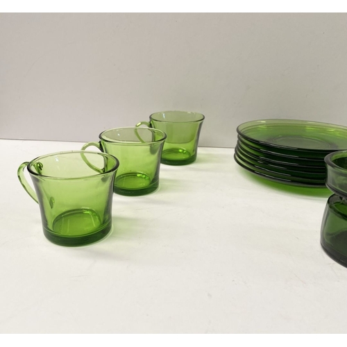 273 - A COLLECTION OF SIX FRENCH GREEN GLASS CUPS & SAUCERS, along with Dansk Designs Denmark vase. The cu... 