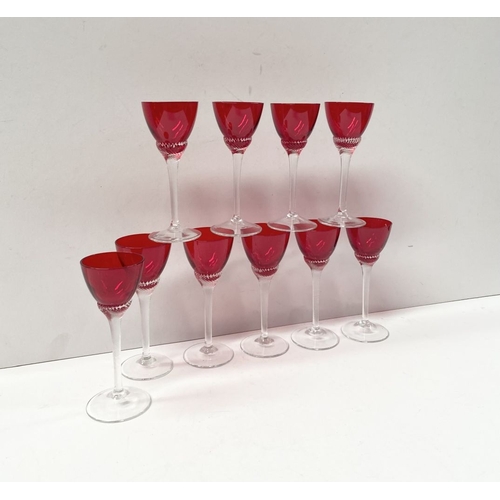 274 - A SET OF TEN VINTAGE RUBY GLASS TWIST STEM LIQUOR GLASSES, ruby glasses with lovely spiral design to... 