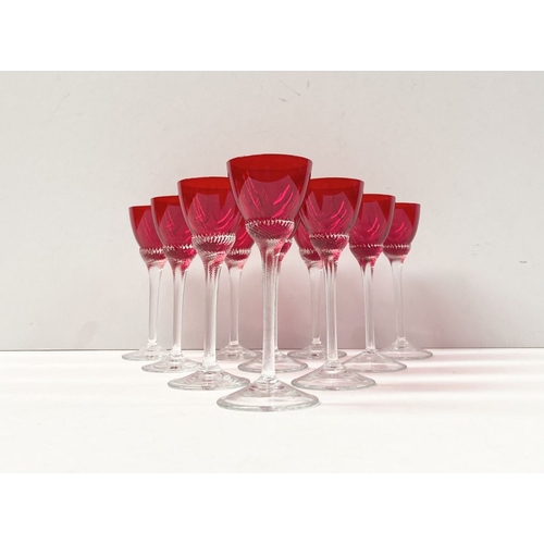 274 - A SET OF TEN VINTAGE RUBY GLASS TWIST STEM LIQUOR GLASSES, ruby glasses with lovely spiral design to... 