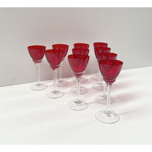 274 - A SET OF TEN VINTAGE RUBY GLASS TWIST STEM LIQUOR GLASSES, ruby glasses with lovely spiral design to... 