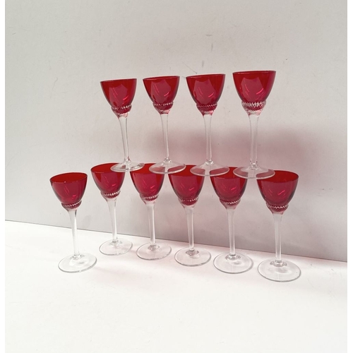 274 - A SET OF TEN VINTAGE RUBY GLASS TWIST STEM LIQUOR GLASSES, ruby glasses with lovely spiral design to... 