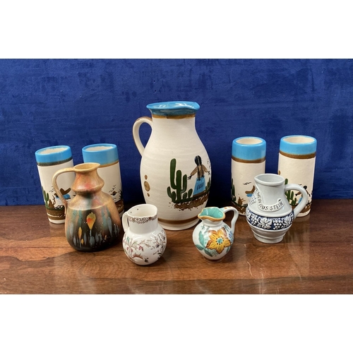 286 - A COLLECTION OF PAINTED TABLEWARE, to include painted Mexican pitcher and tumblers, hand painted Ger... 