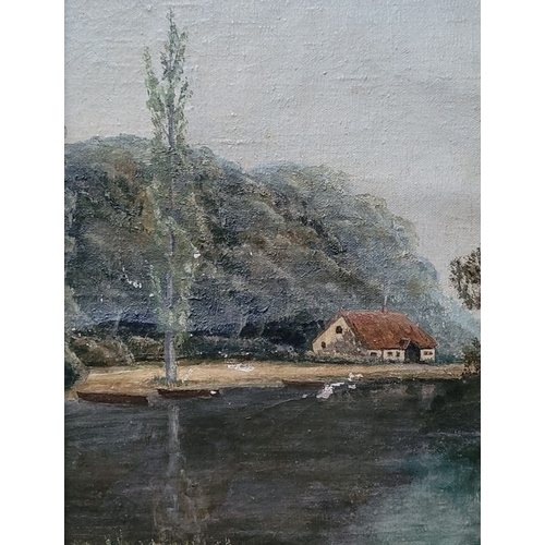 287 - ENGLISH SCHOOL, LATE 19TH - EARLY 20TH CENTURY, THATCHED COTTAGE BY THE LAKE, an oil on canvas, unsi... 