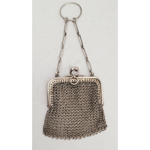 291 - TWO EARLY 20TH CENTURY DELICATELY MADE SILVER MESH PURSES, (i) A small silver mesh sovereign purse, ... 