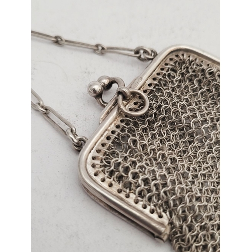 291 - TWO EARLY 20TH CENTURY DELICATELY MADE SILVER MESH PURSES, (i) A small silver mesh sovereign purse, ... 