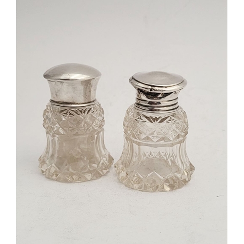 292 - A TRIO OF LATE 19TH CENTURY SILVER TOPPED CUT GLASS DRESSING TABLE CONTAINERS, (i) A rounded cut gla... 