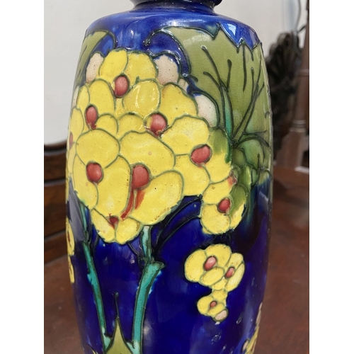 294 - A MINTON ART NOUVEAU SECESSIONIST VASE, c.1900, decorated with stylised yellow flowers with green fo... 