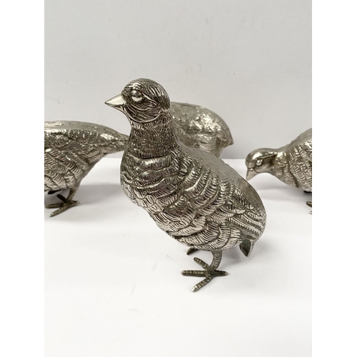 300 - A COLLECTION OF FIVE WHITE METAL QUAILS/GAME BIRDS, possibly silver plated, no visible marked, nicel... 