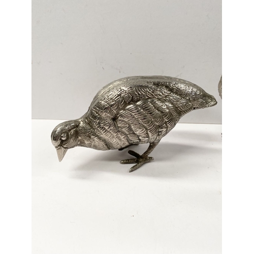 300 - A COLLECTION OF FIVE WHITE METAL QUAILS/GAME BIRDS, possibly silver plated, no visible marked, nicel... 