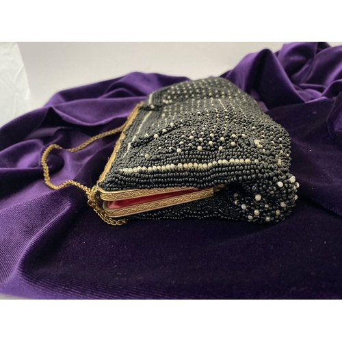 301 - A LOVELY VINTAGE FRENCH LADIES BEADED EVENING BAG/CLUTCH, the lined interior with label reading ‘Han... 