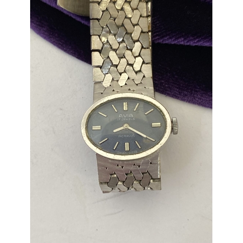 304 - A TRIO OF VINTAGE SILVER TONE LADIES WRISTWATCHES, by Pulsar, Avia & Citron.