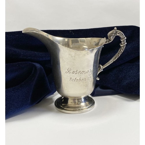 31 - A 1916-66 JUBILEE IRISH SILVER CREAM JUG, Hallmarked B. Moynihan Limerick. Nice simple form with dec... 