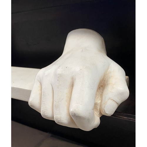 318 - A PLASTER CAST HANGING SHELF, in the form of pair of hands holding shelf, handing hooks to reverse. ... 