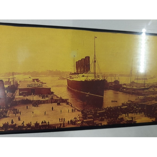 326 - A FRAMED COLOURED PRINT OF LUSITANIA, on the day of its maiden voyage 1907, nicely frame. Dimensions... 