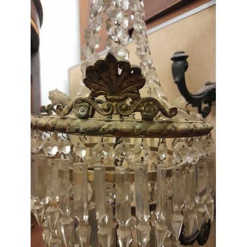 328 - AN ANTIQUE FRENCH EMPIRE STYLE CRYSTAL CHANDELIER, gilt frame with acanthus leaf design to top and s... 