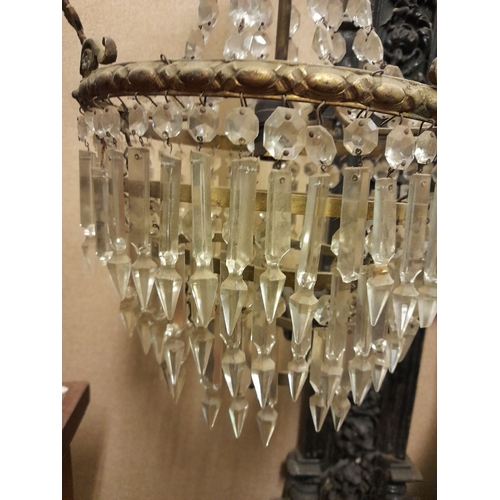 328 - AN ANTIQUE FRENCH EMPIRE STYLE CRYSTAL CHANDELIER, gilt frame with acanthus leaf design to top and s... 