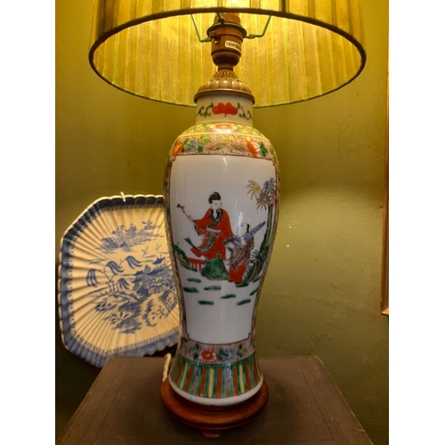 329 - A CHINESE FAMILLE ROSE PAINTED TABLE LAMP, the exterior finely decorated with painted figural pictur... 