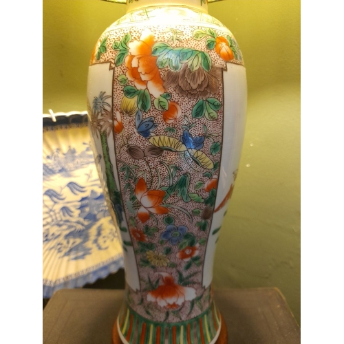 329 - A CHINESE FAMILLE ROSE PAINTED TABLE LAMP, the exterior finely decorated with painted figural pictur... 