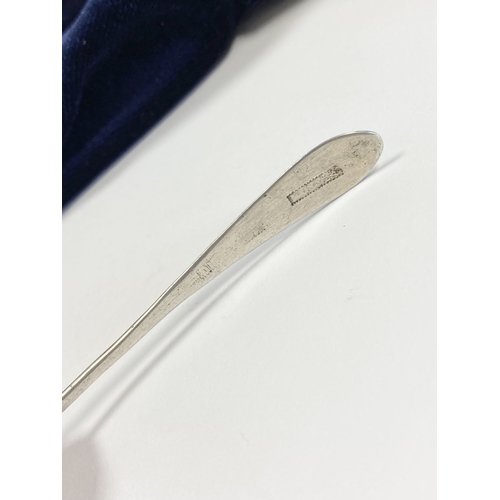 33 - A CORK SILVER BRIGHT CUT SALT SPOON, c.1790. Bright cut engraving to tapered handle with vacant cart... 