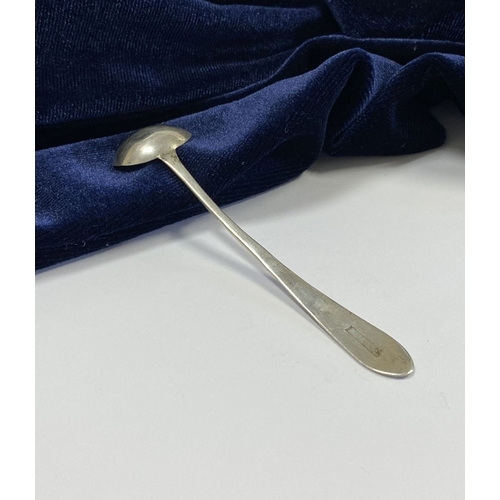 33 - A CORK SILVER BRIGHT CUT SALT SPOON, c.1790. Bright cut engraving to tapered handle with vacant cart... 