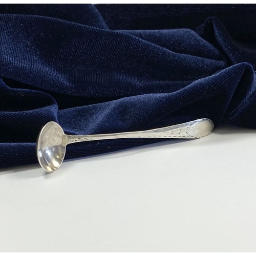 33 - A CORK SILVER BRIGHT CUT SALT SPOON, c.1790. Bright cut engraving to tapered handle with vacant cart... 