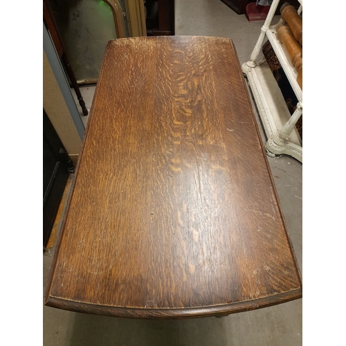 334 - AN OAK BARLEY TWIST GATE LEG SUTHERLAND TABLE, in overall good condition, with repair needed to one ... 