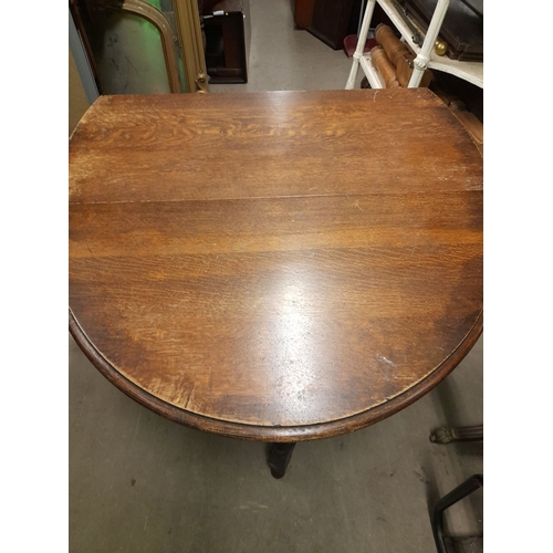 334 - AN OAK BARLEY TWIST GATE LEG SUTHERLAND TABLE, in overall good condition, with repair needed to one ... 