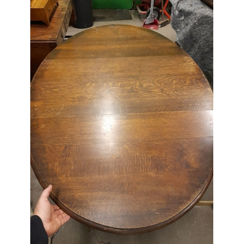 334 - AN OAK BARLEY TWIST GATE LEG SUTHERLAND TABLE, in overall good condition, with repair needed to one ... 