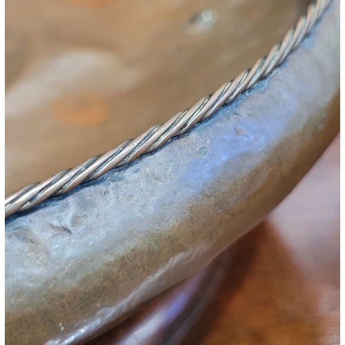 340 - A LARGE IRISH HANDMADE ARTS AND CRAFTS COPPER & BRASS CENTRE BOWL, the handles with a curved scroll ... 