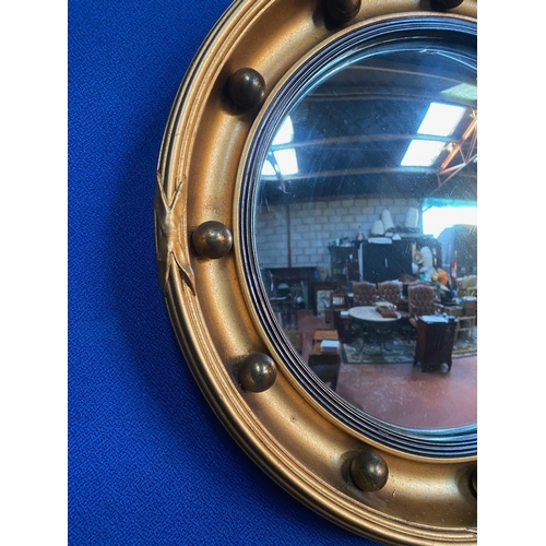 358 - AN EXCELLENT GILT CONVEX MIRROR, the concave giltwood frame with carved beaded border, fluted rope b... 