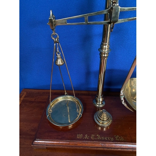 369 - AN EXCELLENT AVERY BRASS WEIGHING SCALES, Makers name to hardwood base, complete with graduating set... 