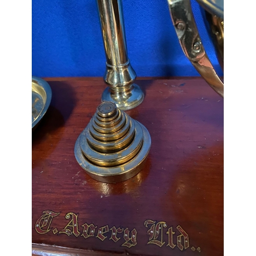 369 - AN EXCELLENT AVERY BRASS WEIGHING SCALES, Makers name to hardwood base, complete with graduating set... 