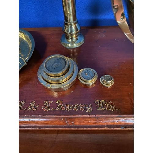 369 - AN EXCELLENT AVERY BRASS WEIGHING SCALES, Makers name to hardwood base, complete with graduating set... 