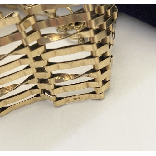 5 - A REALLY BEAUTIFUL 9CT GOLD EIGHT BAR GATE BRACELET, seven bars with twist design to two, the bars g... 