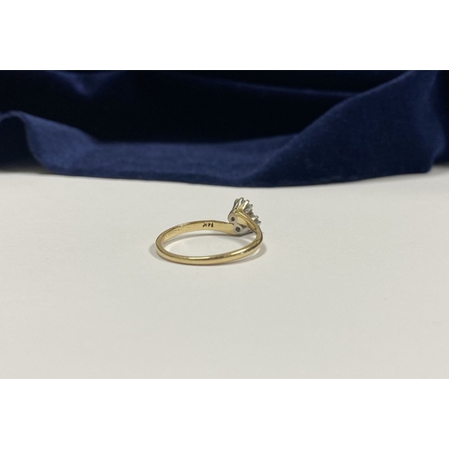 52 - A BEAUTIFUL 14CT YELLOW GOLD TWO STONE DIAMOND RING, two round cut diamonds claw set in raised prong... 