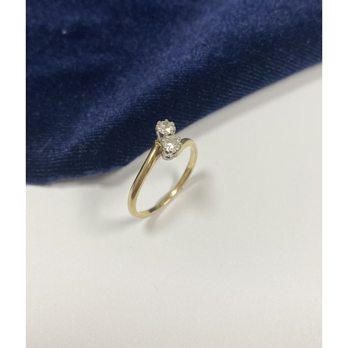 52 - A BEAUTIFUL 14CT YELLOW GOLD TWO STONE DIAMOND RING, two round cut diamonds claw set in raised prong... 