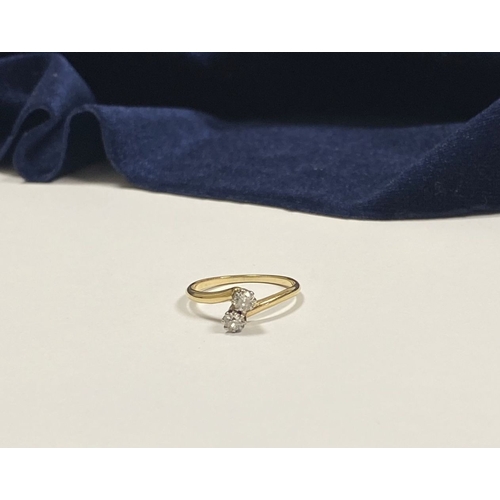 52 - A BEAUTIFUL 14CT YELLOW GOLD TWO STONE DIAMOND RING, two round cut diamonds claw set in raised prong... 