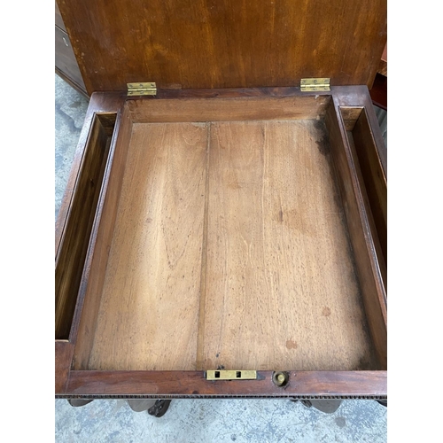 53 - A 19TH CENTURY SEWING/WORKS TABLE, the crossbanded lift top opening to fitted removable tray, above ... 