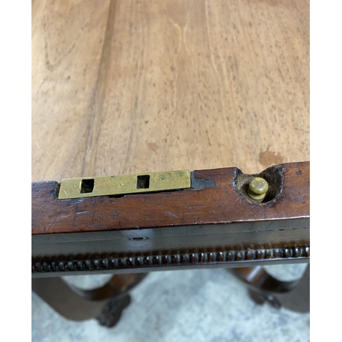 53 - A 19TH CENTURY SEWING/WORKS TABLE, the crossbanded lift top opening to fitted removable tray, above ... 