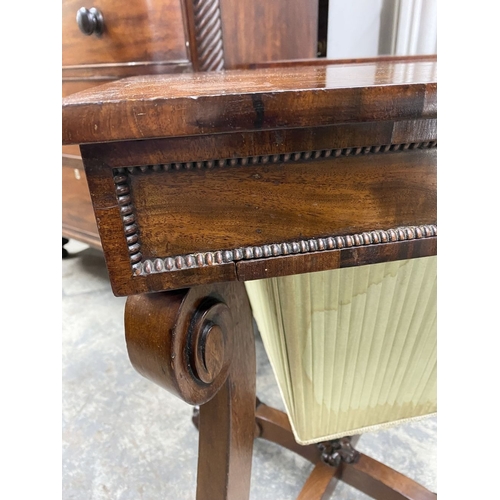 53 - A 19TH CENTURY SEWING/WORKS TABLE, the crossbanded lift top opening to fitted removable tray, above ... 