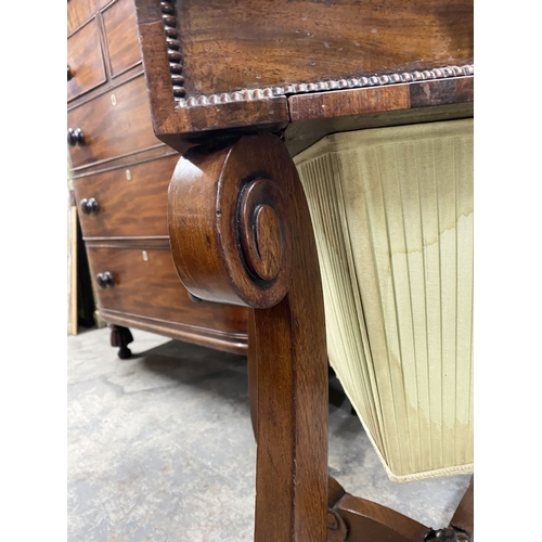 53 - A 19TH CENTURY SEWING/WORKS TABLE, the crossbanded lift top opening to fitted removable tray, above ... 