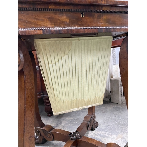 53 - A 19TH CENTURY SEWING/WORKS TABLE, the crossbanded lift top opening to fitted removable tray, above ... 