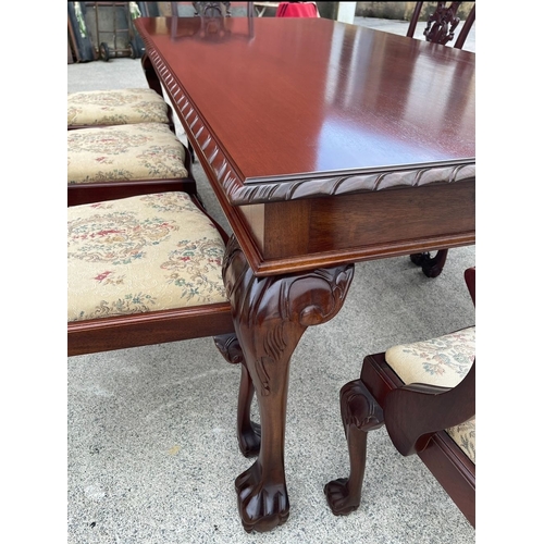 58 - A GOOD QUALITY IRISH MAHOGANY DINING/BOARDROOM SUITE, made in Dublin. To include dining table and si... 