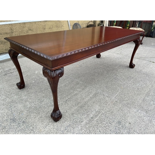 58 - A GOOD QUALITY IRISH MAHOGANY DINING/BOARDROOM SUITE, made in Dublin. To include dining table and si... 