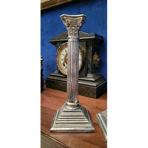 6 - A FINE PAIR OF SILVER CORINTHIAN COLUMN CANDLESTICKS, elegant pair with square graduated step base w... 