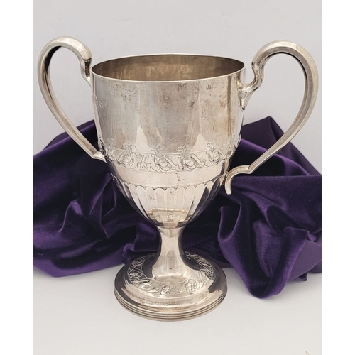 7 - A GEORGE III IRISH SILVER LOVING CUP, by Matthew West, Dublin c.1788. Of nice proportions, with twin... 