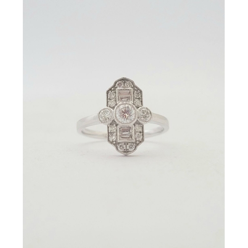 70 - AN ART DECO INSPIRED DIAMOND RING, in the classical Art Deco design with a mix of baguette and round... 