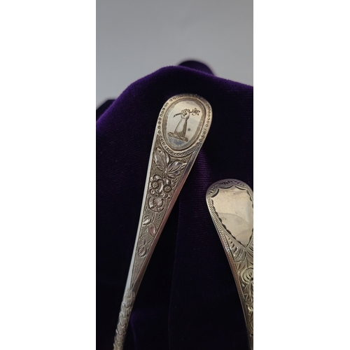 73 - TWO VERY FINE SILVER BERRY SPOONS, (i) AN EARLY 19TH CENTURY SILVER BERRY SPOON, with decorated stem... 